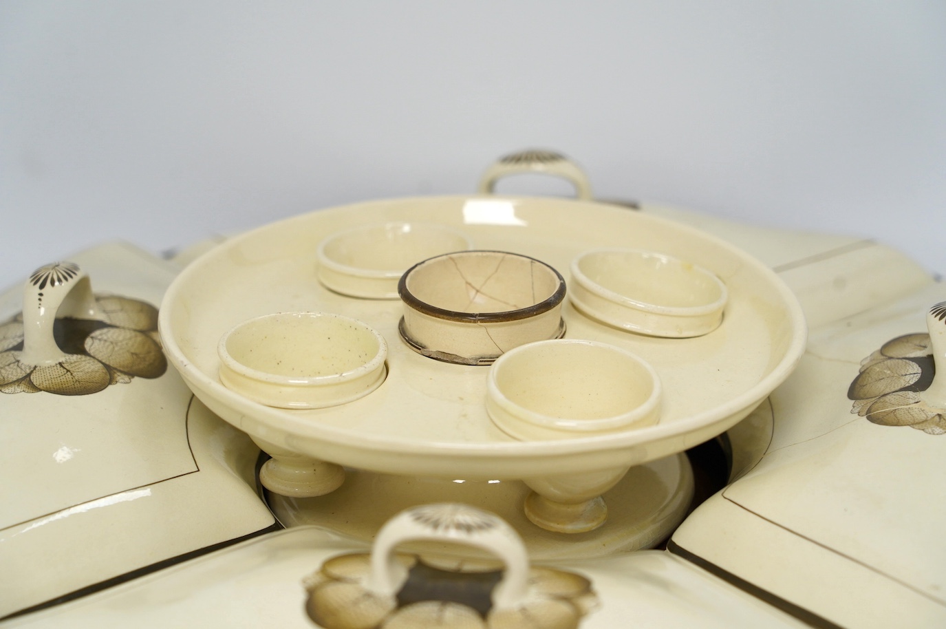 A late 18th century creamware breakfast set, fitted within later mahogany tray, 52cm handle to handle. Condition - some damage